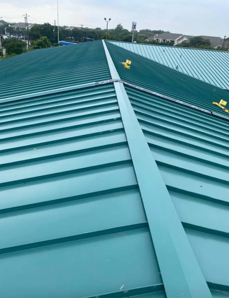 Green commercial metal roof ridge and valley for Metal Roof Repair in Mason City